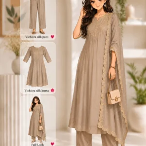 Beige vichitra silk flared calf length party wear kurta set with pants, dupatta and floral embroidery.