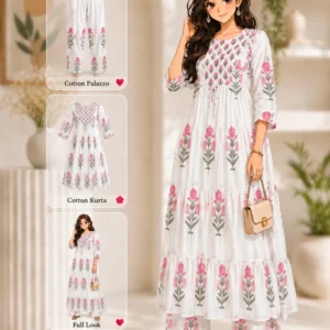 White cotton anarkali ankle length festive kurta set with palazzos, mulmul dupatta and tassel detailing.
